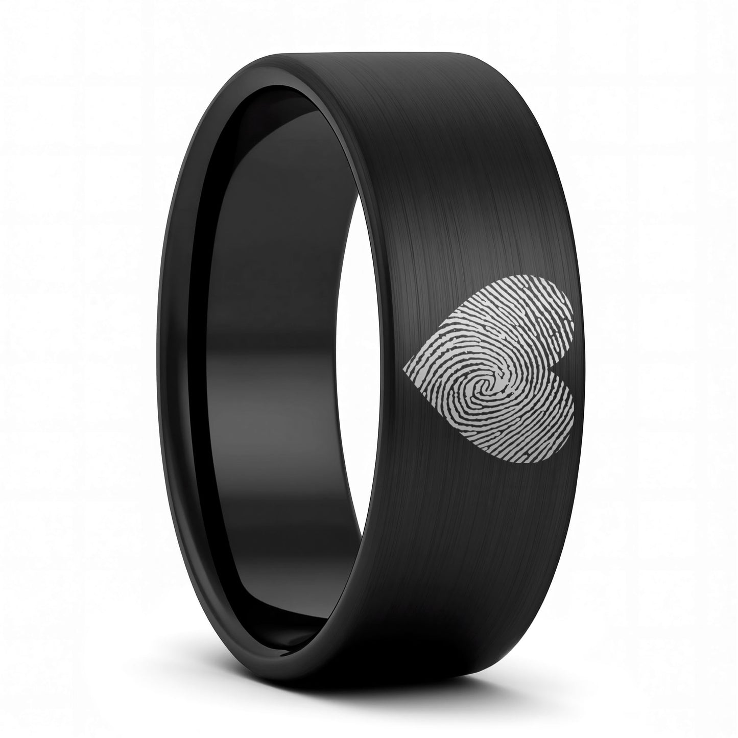 A custom heart fingerprint brushed black tungsten men's wedding band displayed on a plain white background.