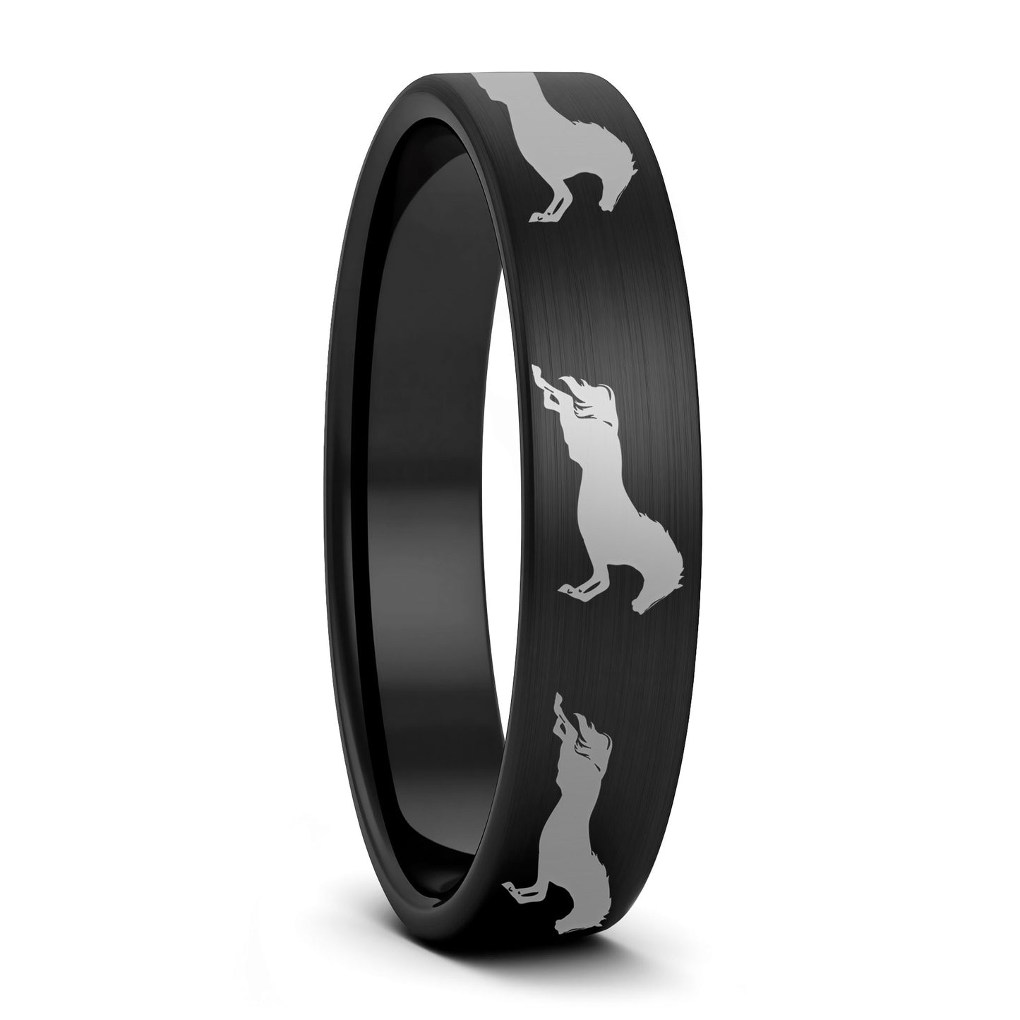 A galloping horses brushed black tungsten women's wedding band displayed on a plain white background.