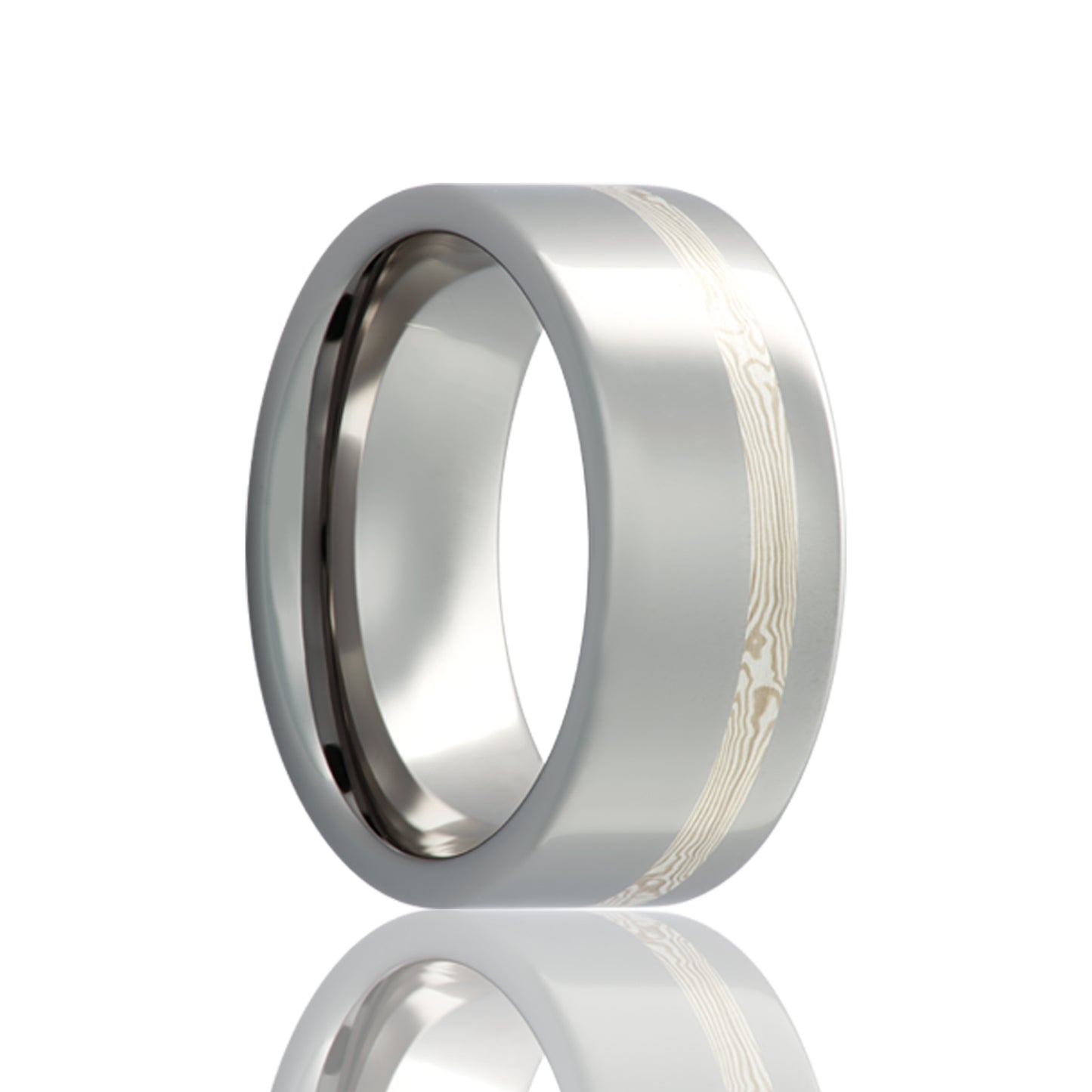 A asymmetrical 14k white gold & silver mokume gane inlay cobalt wedding band displayed on a neutral white background.