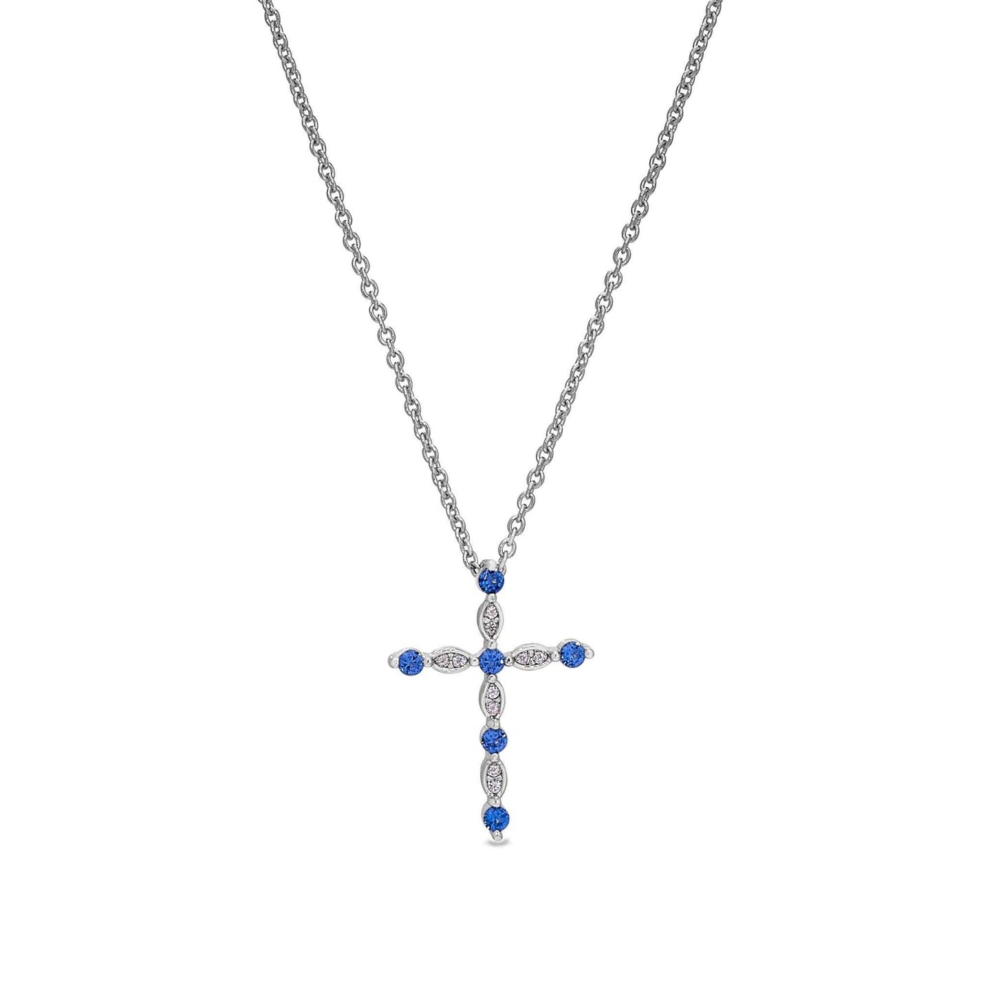 A cross necklace with simulated diamonds displayed on a neutral white background.