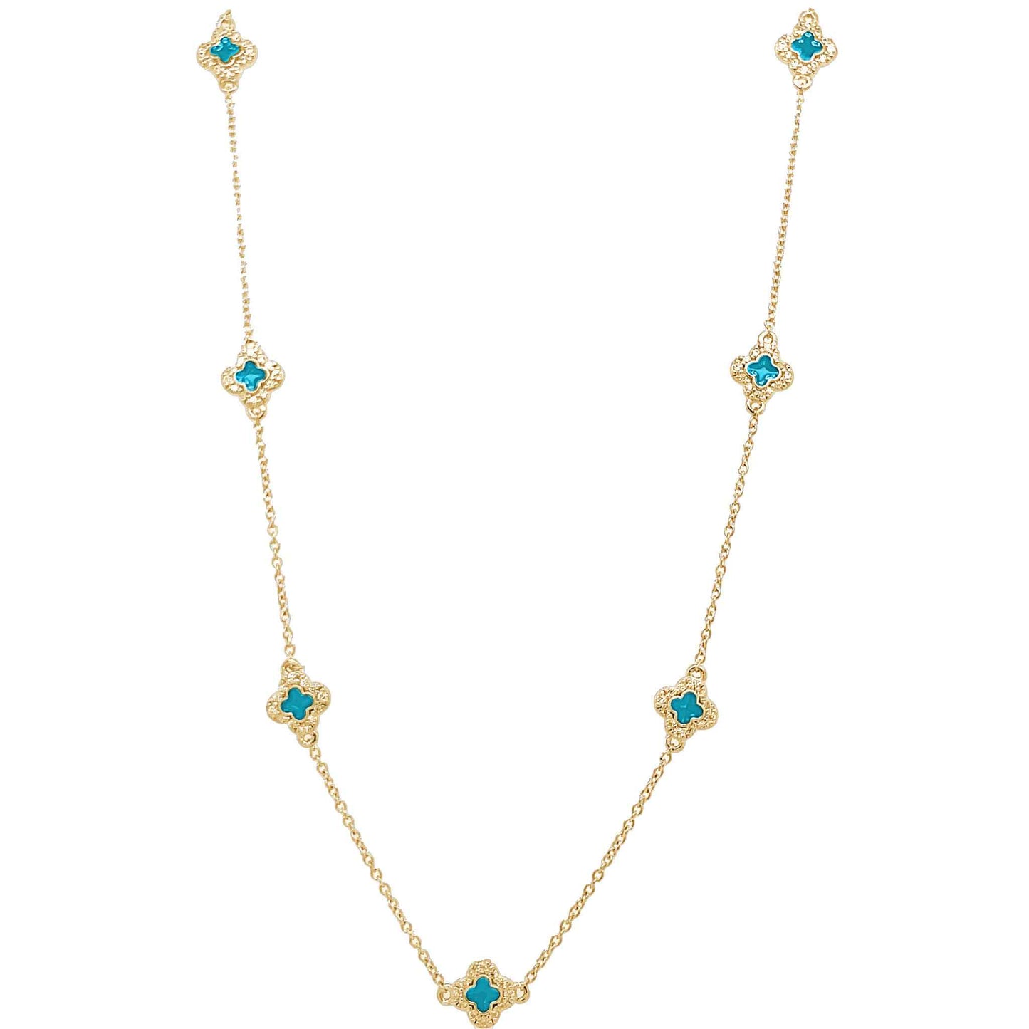 A enamel clover station necklace with simulated diamonds displayed on a neutral white background.