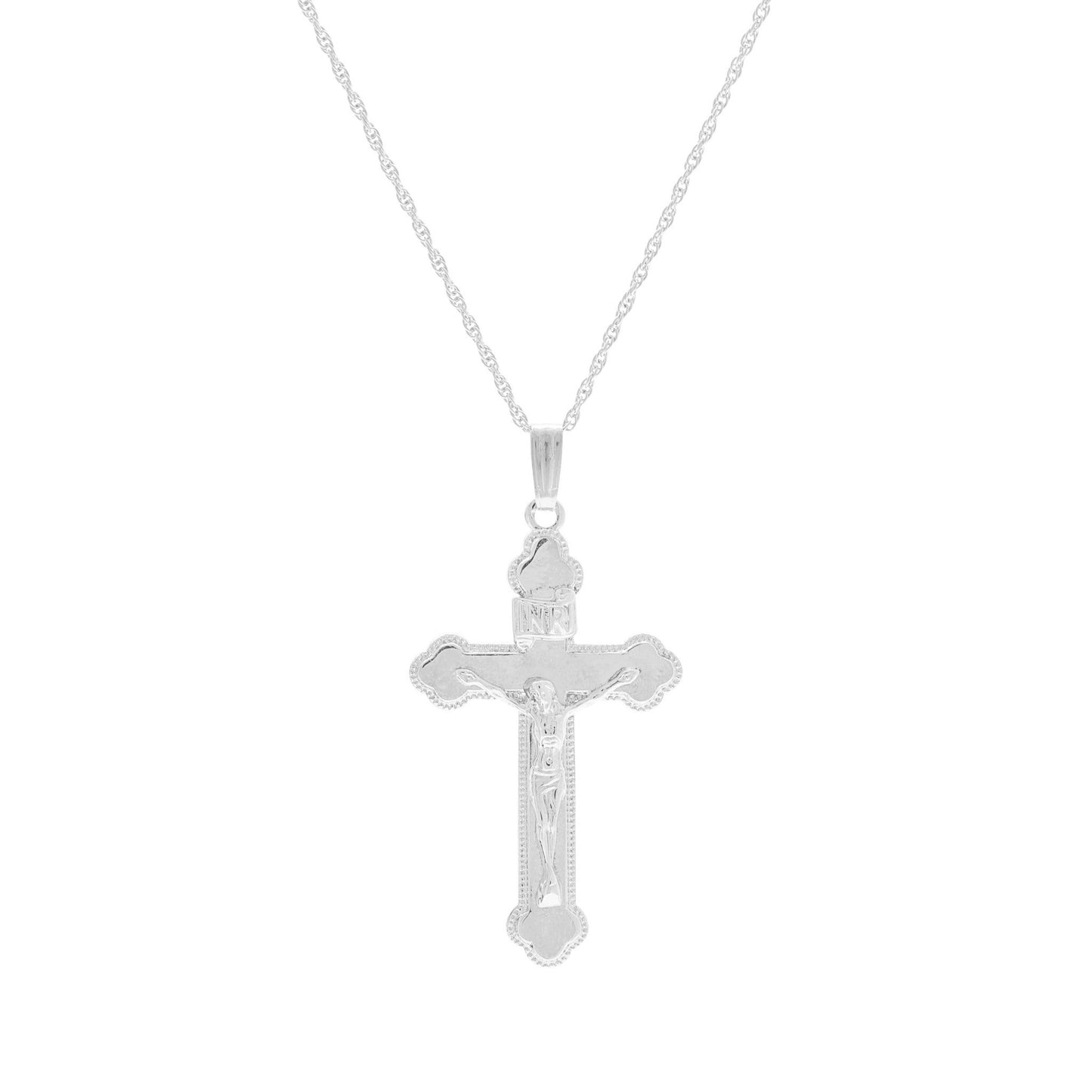 A polished crucifix necklace displayed on a neutral white background.