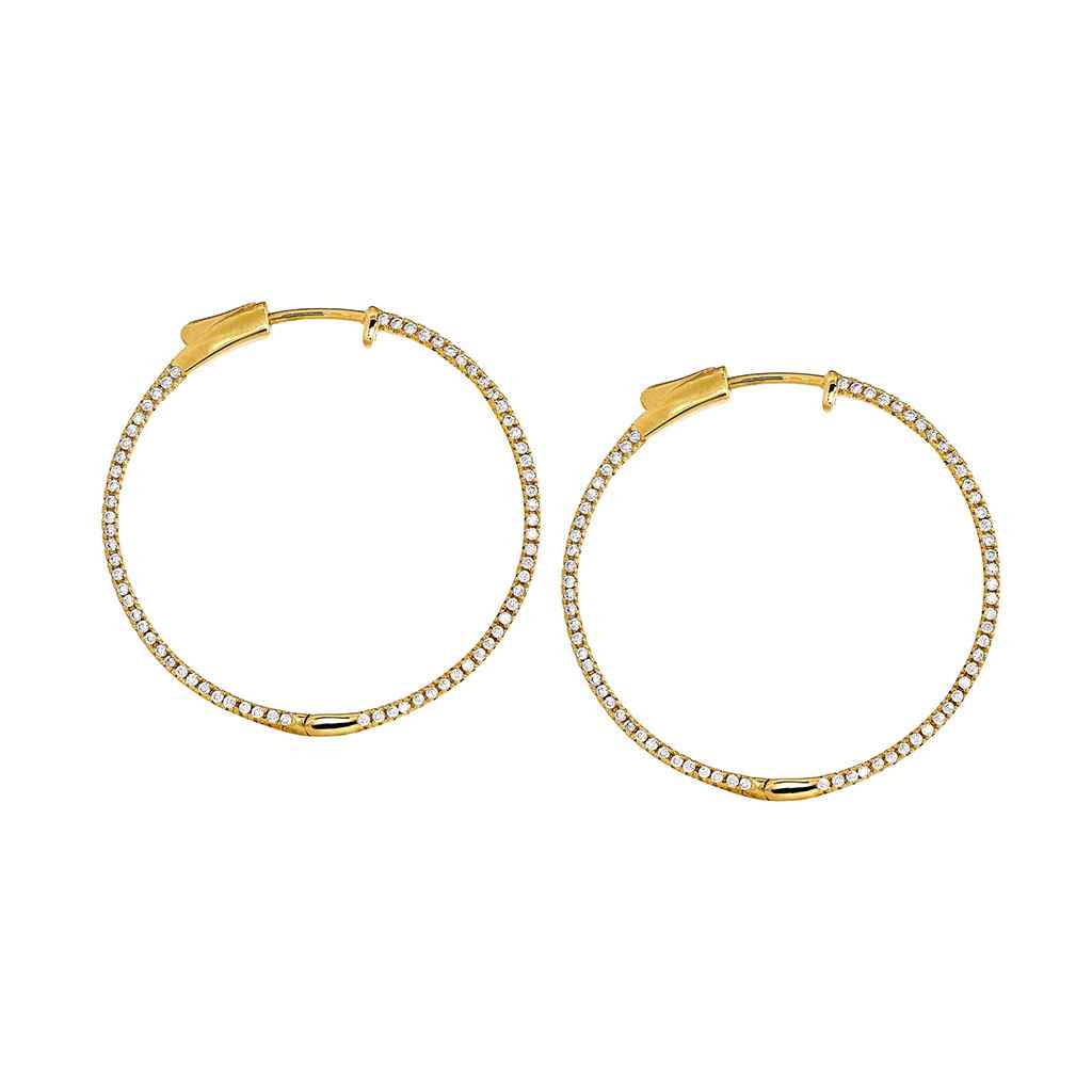 A side stone large hoop earrings with simulated diamonds displayed on a neutral white background.