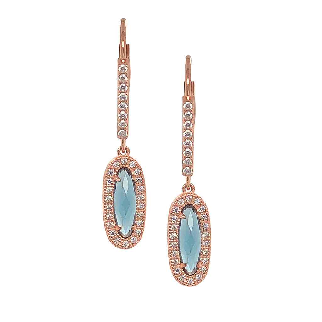 A simulated blue topaz & diamonds oblong earrings displayed on a neutral white background.
