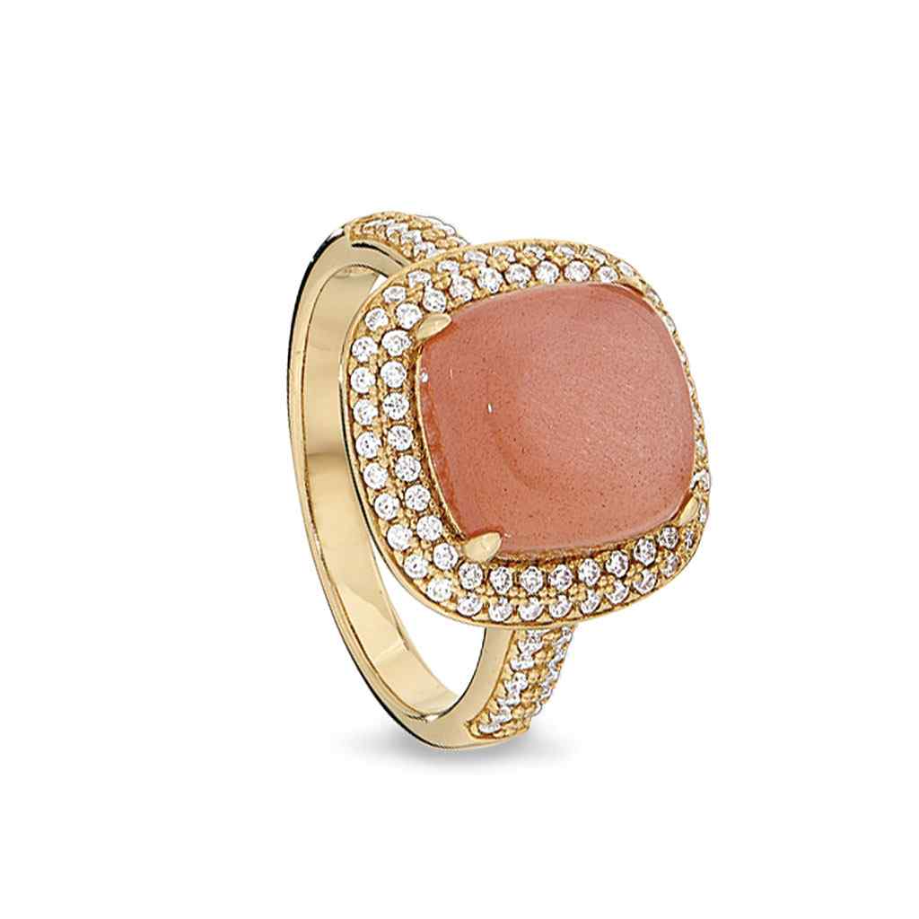A sterling silver peach quartz ring with simulated diamonds displayed on a neutral white background.