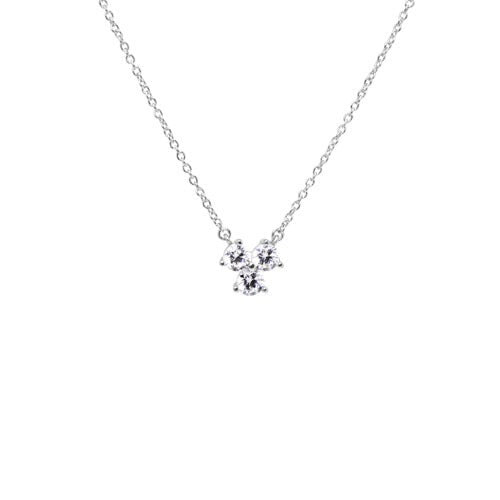 A three stone simulated diamond necklace displayed on a neutral white background.