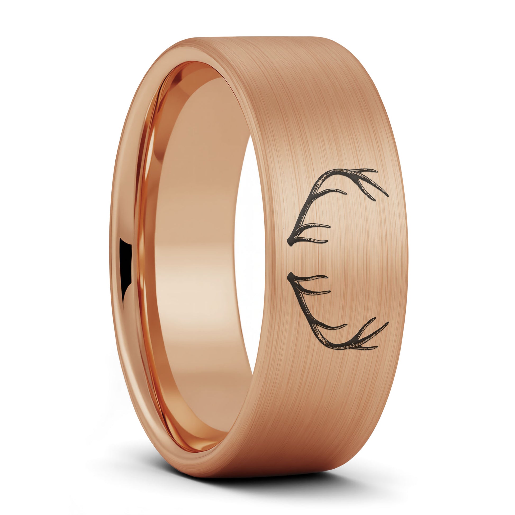A antler engraved brushed rose gold tungsten men's wedding band displayed on a plain white background.