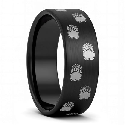 A bear paw print brushed black tungsten men's wedding band displayed on a plain white background.