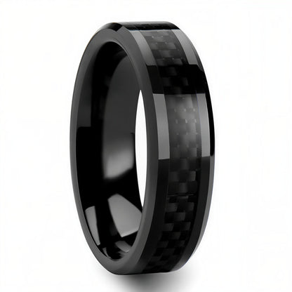 Black titanium ring with carbon fiber inlay on a white background