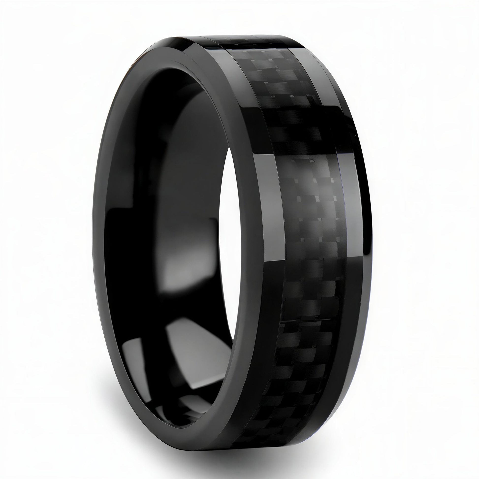 Black titanium  ring with carbon fiber inlay on a white background