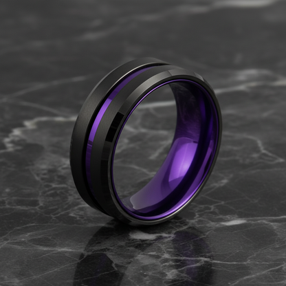 Ring with purple interior and black exterior on a gray background