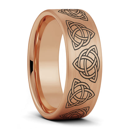 A celtic trinity knot brushed rose gold tungsten men's wedding band displayed on a plain white background.