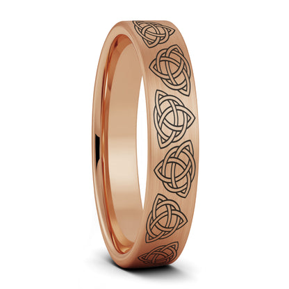 A celtic trinity knot brushed rose gold tungsten women's wedding band displayed on a plain white background.