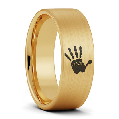 A custom handprint brushed gold tungsten men's wedding band displayed on a plain white background.