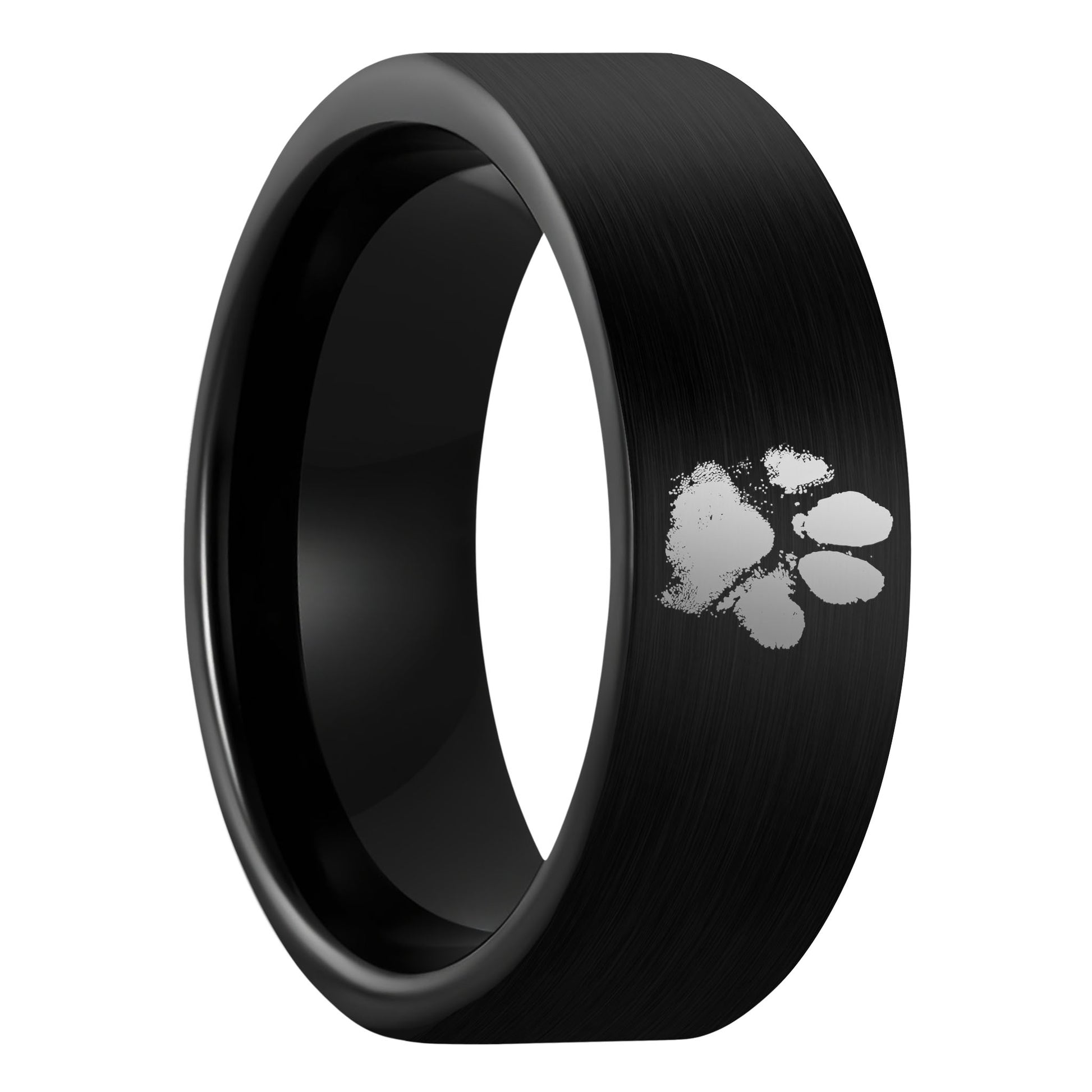A custom paw print brushed black tungsten men's wedding band displayed on a plain white background.
