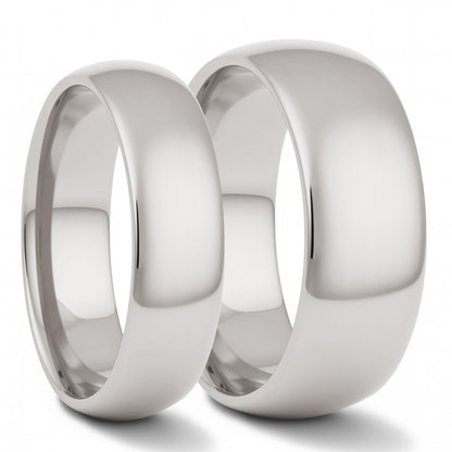 Two polished silver-toned metal bands, one smaller and one larger, shown standing upright against a clean white background.