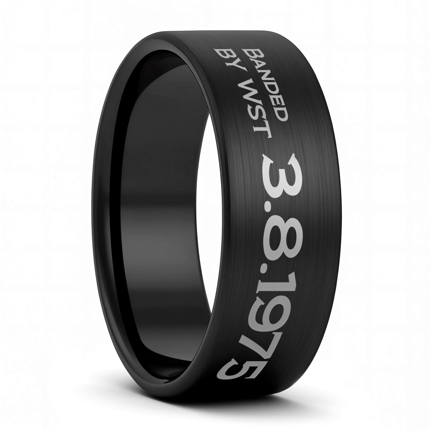A duck band style custom engraved brushed black tungsten men's wedding band displayed on a plain white background.