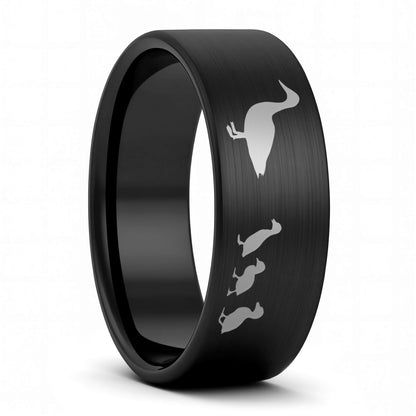 A duck ducklings brushed black tungsten men's wedding band displayed on a plain white background.