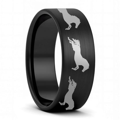 A galloping horses brushed black tungsten men's wedding band displayed on a plain white background.