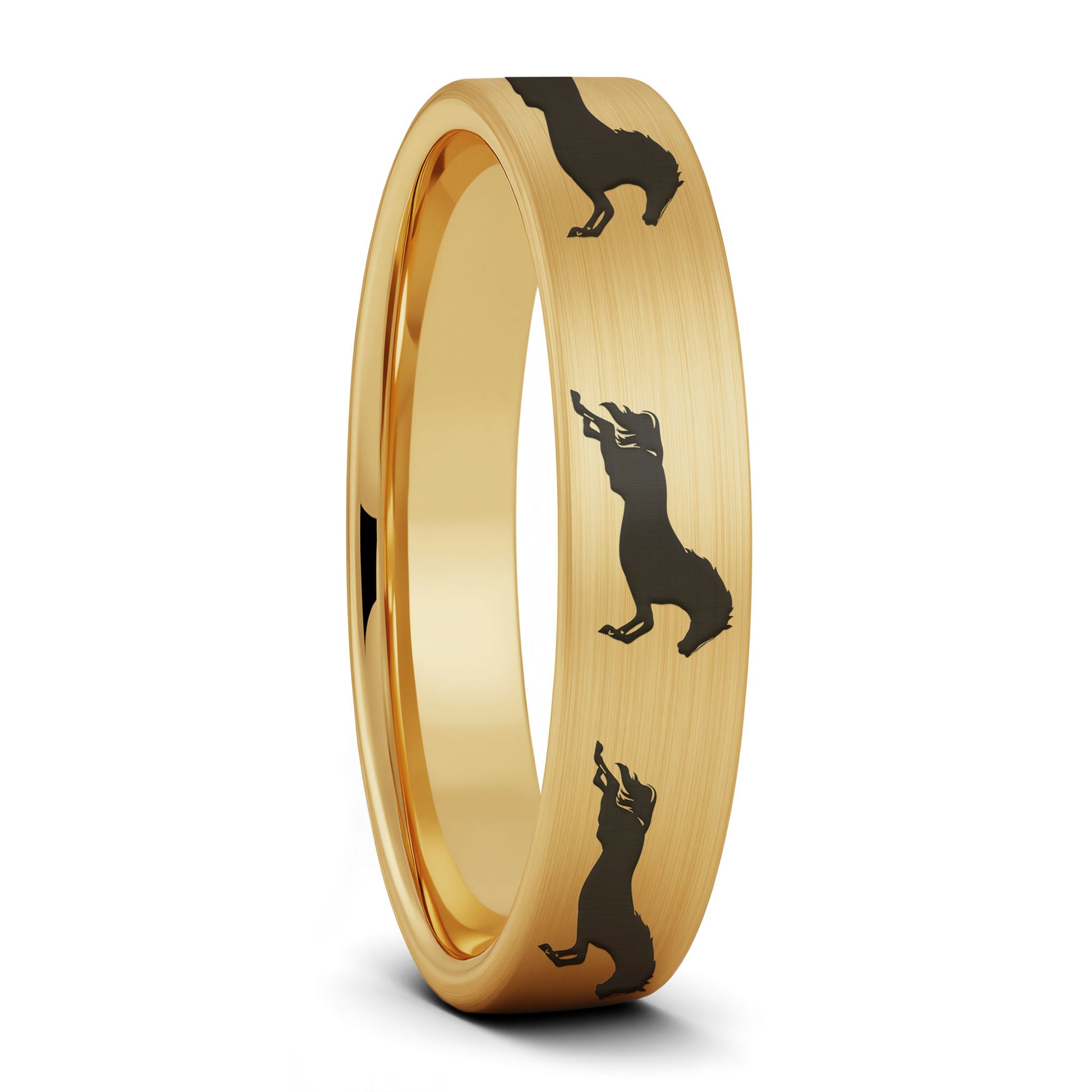A galloping horses brushed gold tungsten women's wedding band displayed on a plain white background.