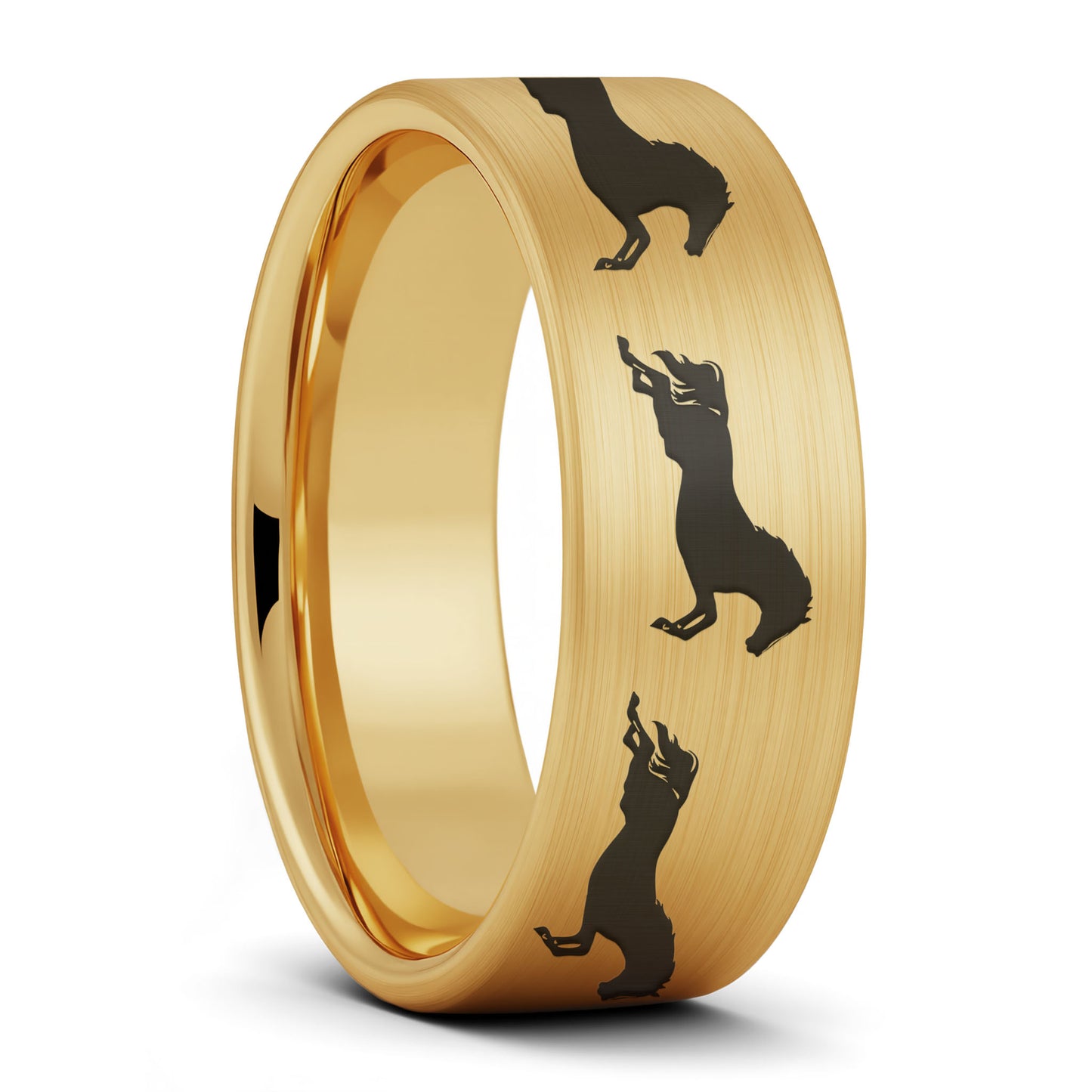 A galloping horses brushed gold tungsten men's wedding band displayed on a plain white background.