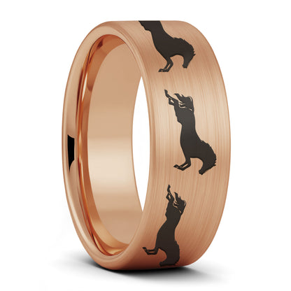 A galloping horses brushed rose gold tungsten men's wedding band displayed on a plain white background.