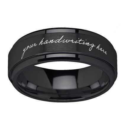 Black ring with 'your handwriting here' text on a white background