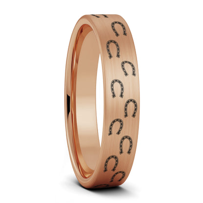 A horseshoes brushed rose gold tungsten women's wedding band displayed on a plain white background.