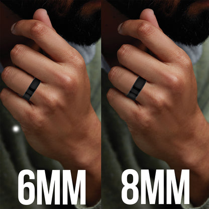 Side-by-side comparison of a black metal band ring shown on a person's hand, labeled 6MM on the left and 8MM on the right, to demonstrate width difference.