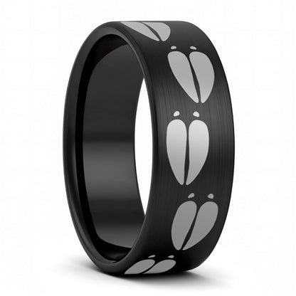 A moose tracks brushed black tungsten men's wedding band displayed on a plain white background.