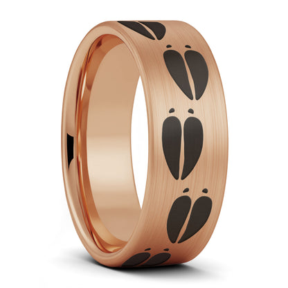 A moose tracks brushed rose gold tungsten men's wedding band displayed on a plain white background.