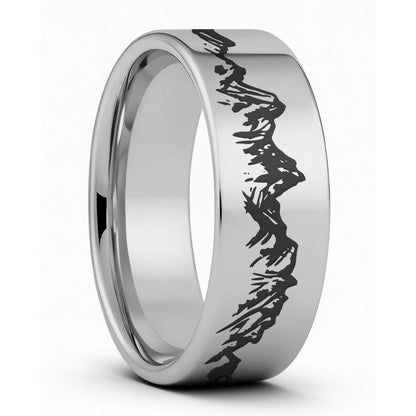 Silver tungsten ring with black engraved  mountain design on a white background