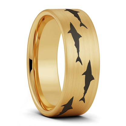 A shark brushed gold tungsten men's wedding band displayed on a plain white background.