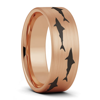 A shark brushed rose gold tungsten men's wedding band displayed on a plain white background.