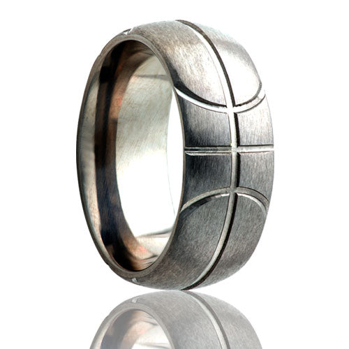 A basketball pattern domed satin finish titanium wedding band displayed on a neutral white background.