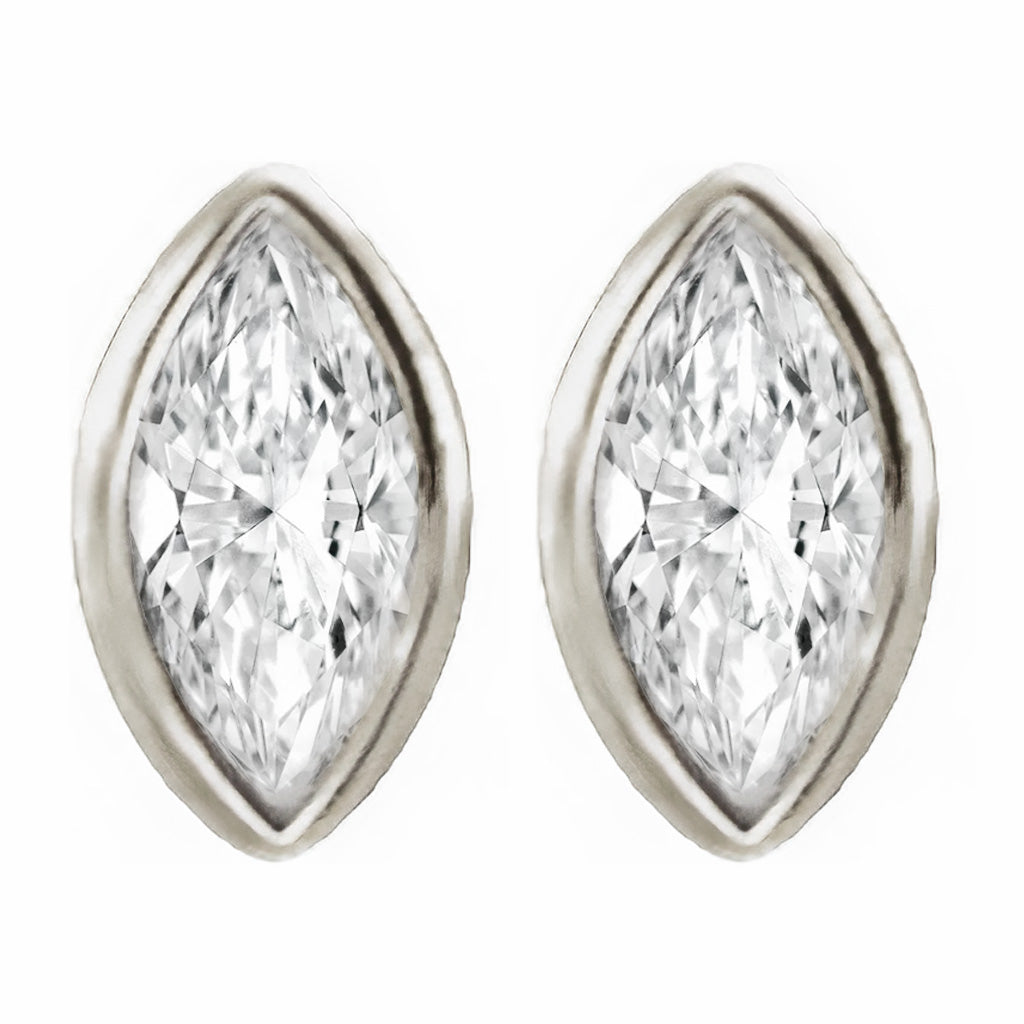 A 14k gold marquise diamond flat back earrings displayed on a neutral white background.