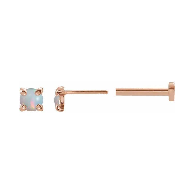 A 14k gold round white opal flat back earrings displayed on a neutral white background.