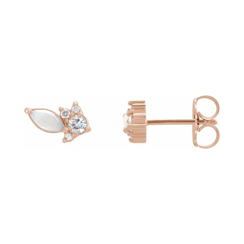A 14k gold white opal & diamond earrings displayed on a neutral white background.