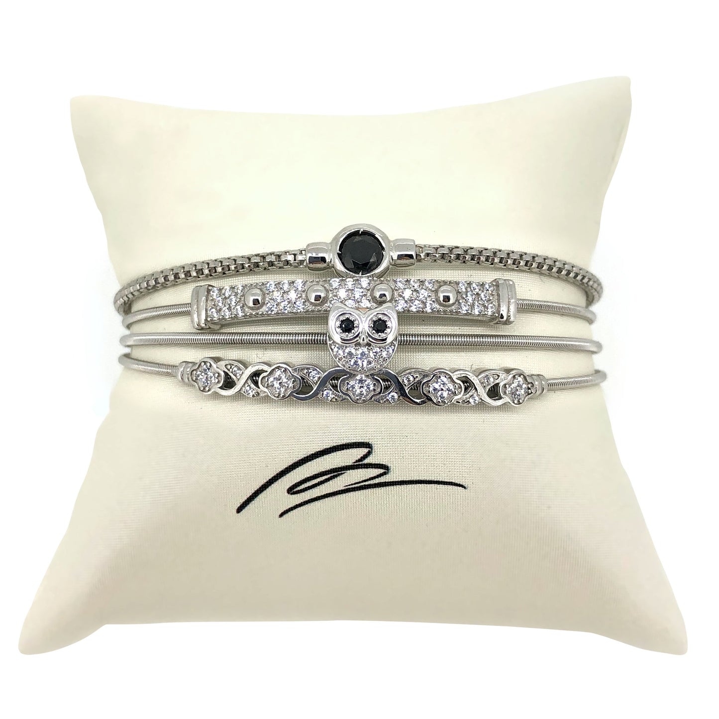 A flexible cable circle accent bracelet with simulated diamonds displayed on a neutral white background.