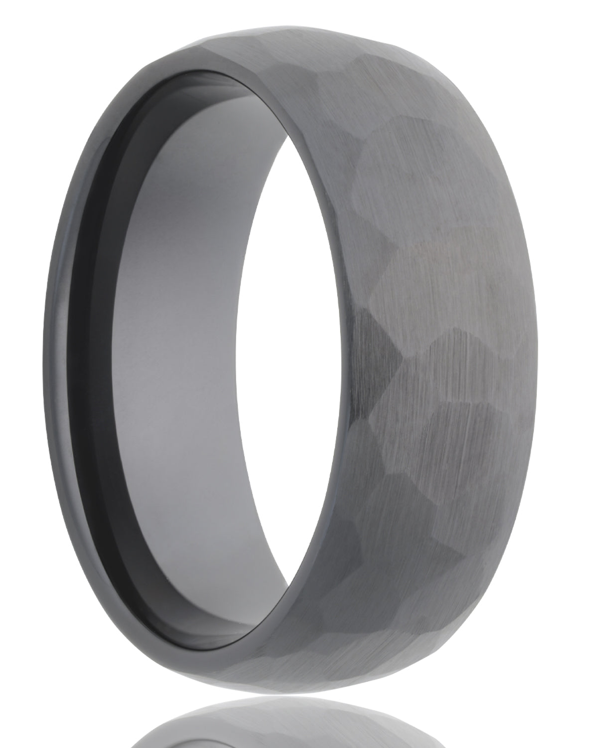 A domed hammered black ceramic wedding band displayed on a neutral white background.