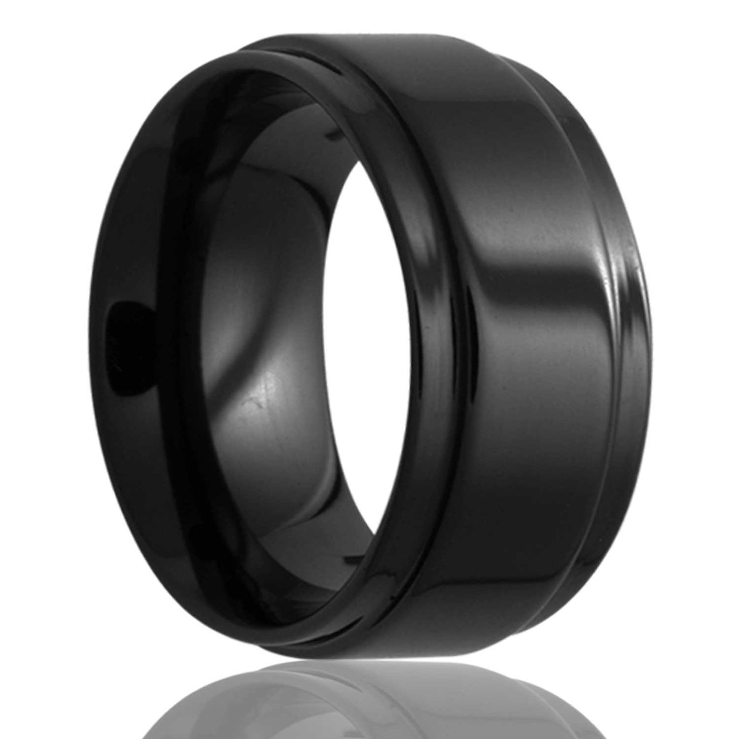 A black ceramic men's wedding band with stepped edges displayed on a neutral white background.
