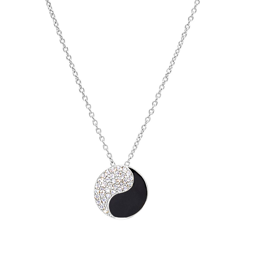 A black enamel yin yang necklace with simulated diamonds displayed on a neutral white background.