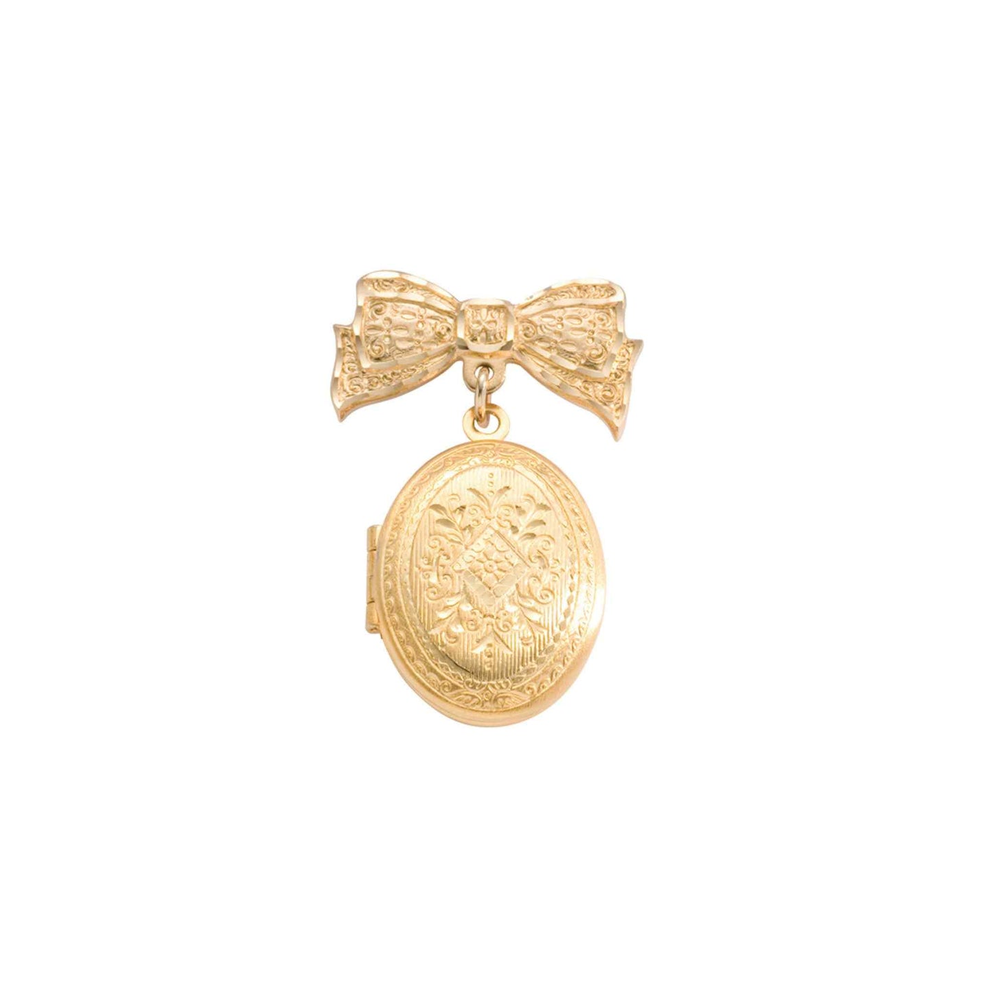 A bow pin and oval locket with bezel inserts displayed on a neutral white background.