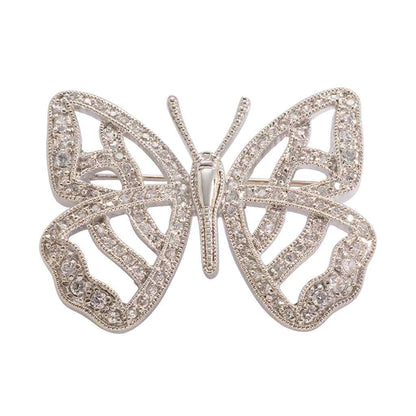 A butterfly pin with simulated diamond displayed on a neutral white background.