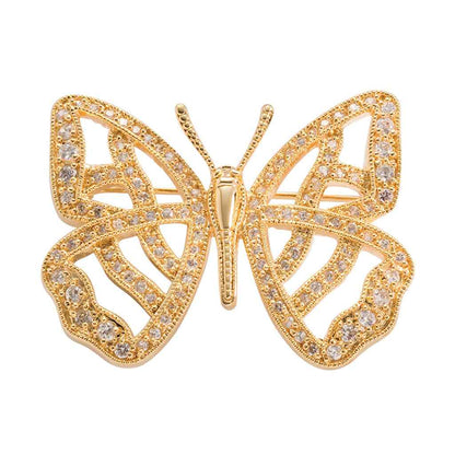 A butterfly pin with simulated diamond displayed on a neutral white background.