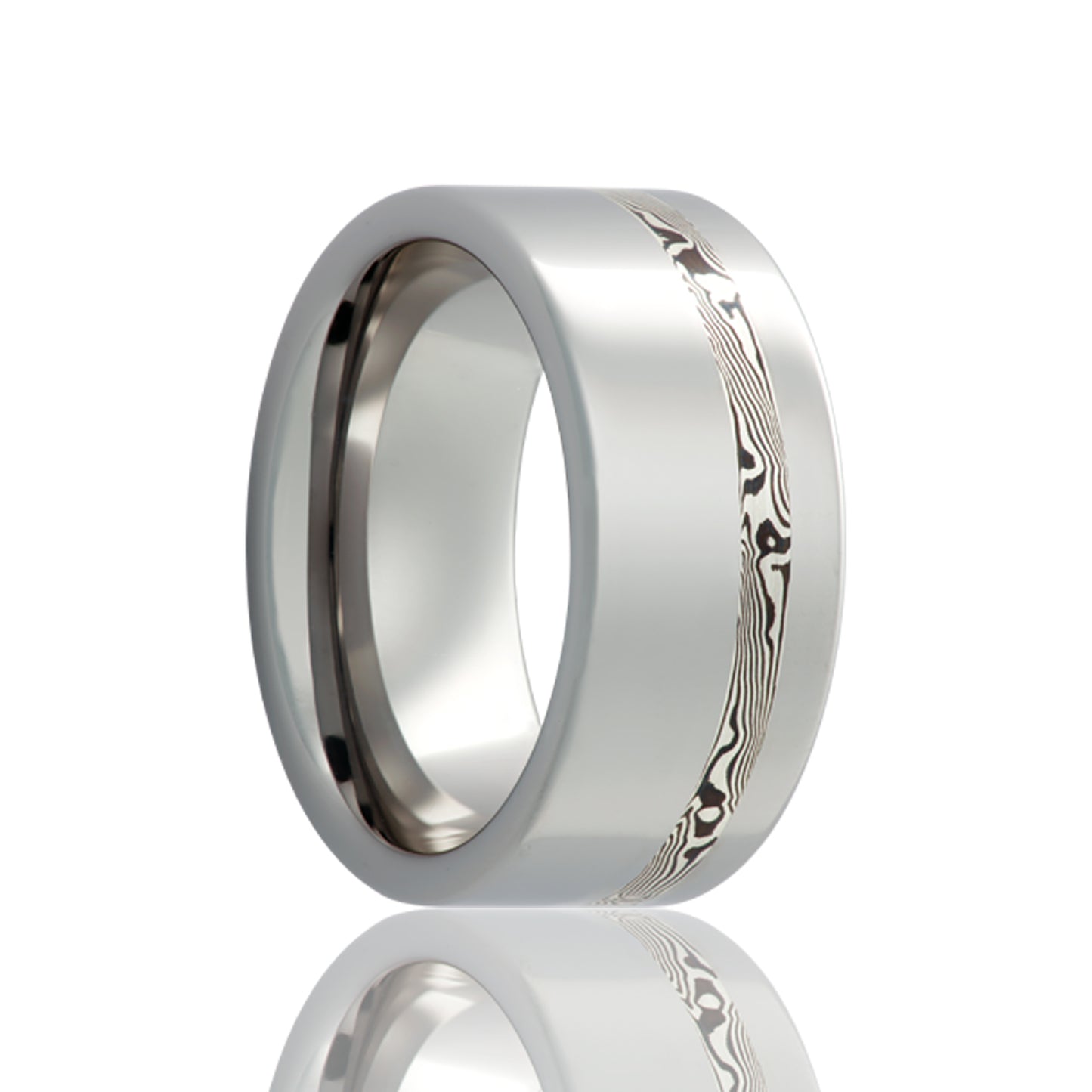 A shakudo & sterling silver mokume gane inlay cobalt wedding band displayed on a neutral white background.