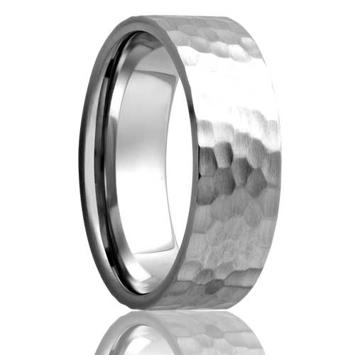 A hammered cobalt wedding band displayed on a neutral white background.