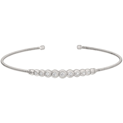 A flexible cable bracelet with graduated simulated diamonds displayed on a neutral white background.