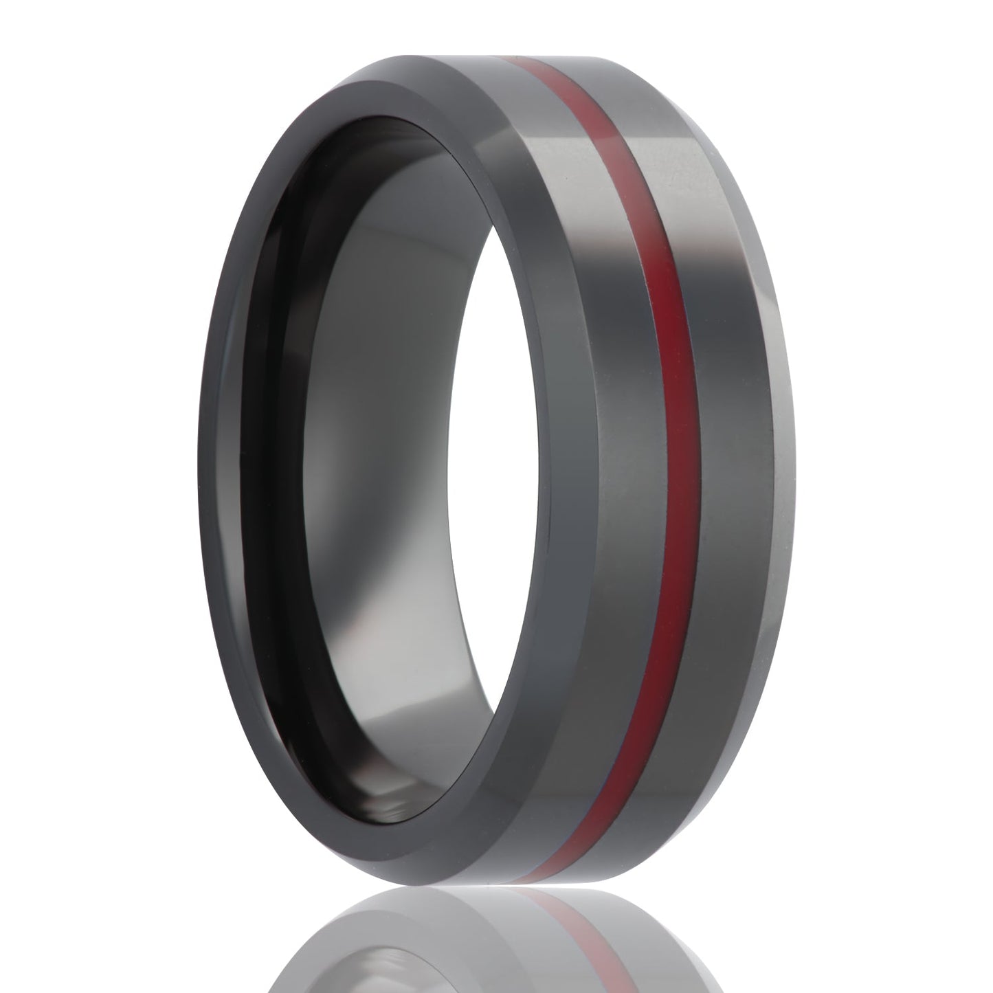 A black ceramic wedding band with red groove & beveled displayed on a neutral white background.