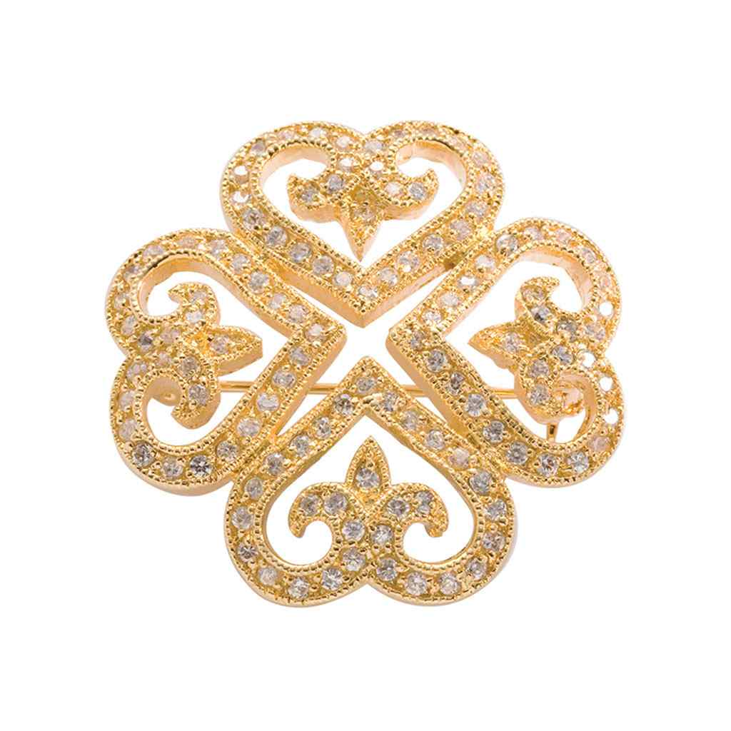 A clover pin with simulated diamonds displayed on a neutral white background.